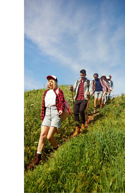 gropu of hikers walking down a hill