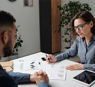 two people meeting at desk