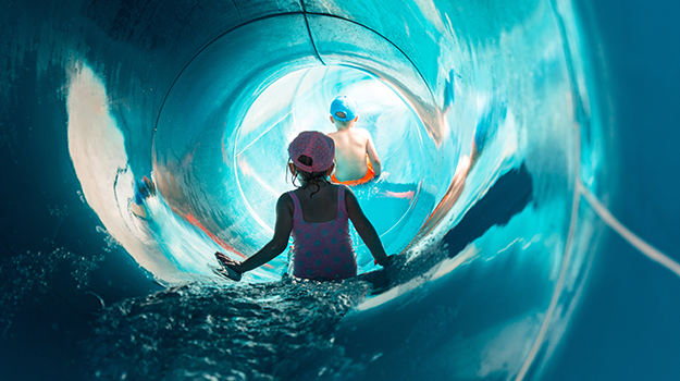 children going down a waterslide