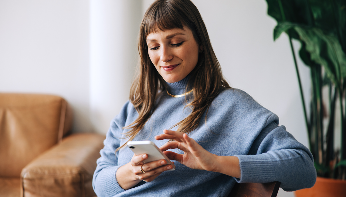 woman looking at phone