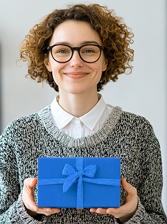 woman holding blue gift box